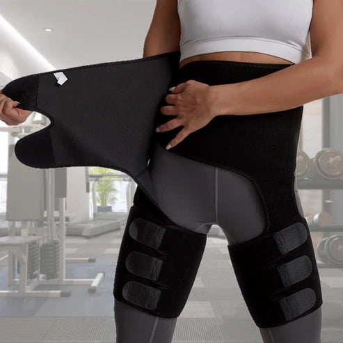 Person adjusting the One-Piece Adjustable Waist Belt for comfort during a workout in a gym setting.