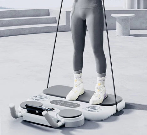 Person using a multifunctional push-up board with resistance bands for a full body workout in a minimalistic outdoor setting.